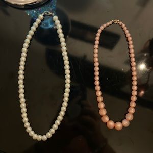 Set of two faux pearls one pink and one white